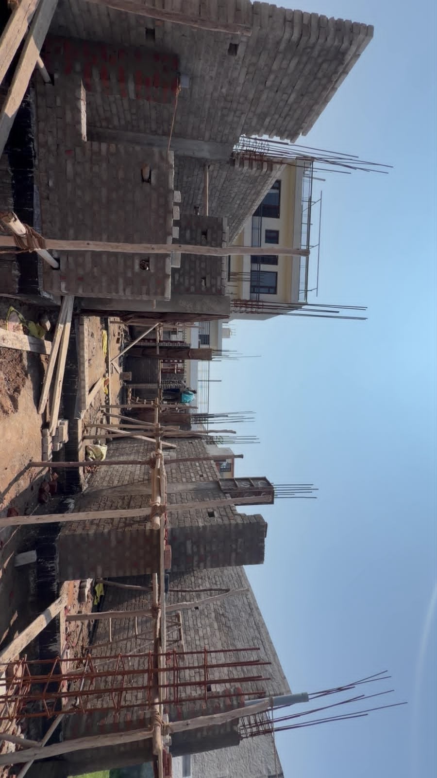 Civil engineering framework under clear sky representing construction services